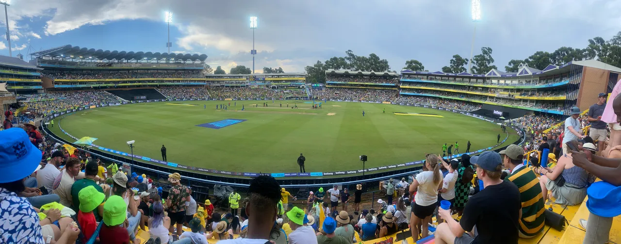 Spectators surrounding the Wanderers cricket field during an SA20 match.